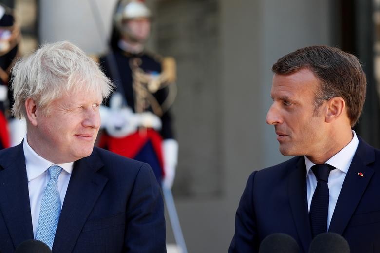 Thủ tướng Anh Boris Johnson và Tổng thống Pháp Emmanuel Macron. Ảnh: Reuters