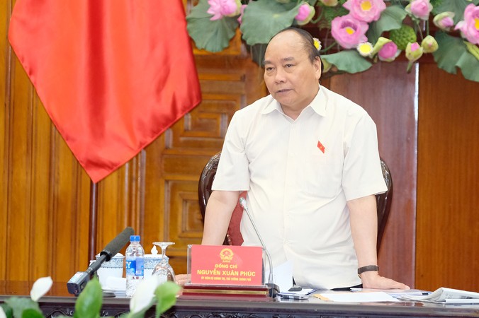 Thủ tướng Nguyễn Xuân Phúc nhất trí việc phát triển Khu kinh tế Dung Quất thành Trung tâm Lọc hóa dầu và năng lượng quốc gia. Ảnh: VGP/Quang Hiếu.
