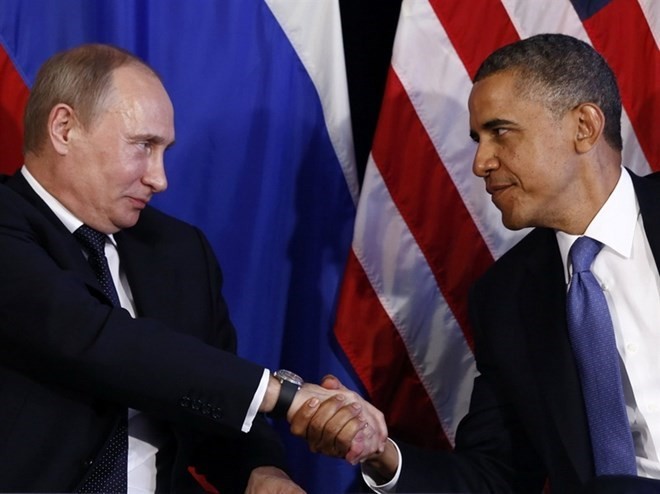Tổng thống Mỹ Obama (phải) và Tổng thống Nga Putin có thể gặp nhau khi dự Hội nghị APEC.