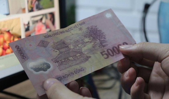 Thưởng Tết 50.000đ - Bạn muốn biết về mức thưởng Tết của người Việt Nam truyền thống? Hãy xem hình ảnh về tờ tiền 50.000đ với thiết kế đặc biệt dành riêng cho mùa Tết để cảm nhận sự gắn kết và trân trọng giá trị của tiền tệ.
