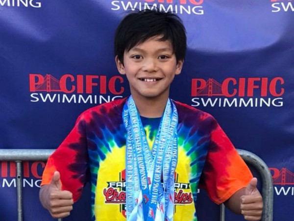 Chân dung cậu bé "siêu nhân" đánh bại kỷ lục của huyền thoại bơi lội Michael Phelps